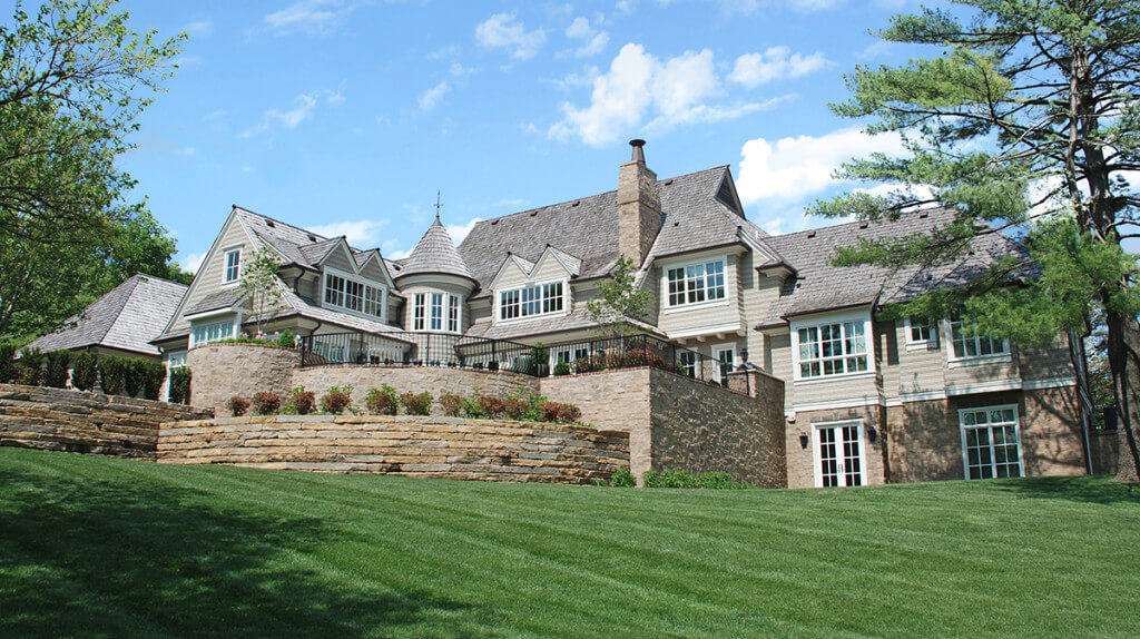 Backyard and Exterior of Shingle Style Home in Lawrence, Kansas, Designed by NSPJ Architects