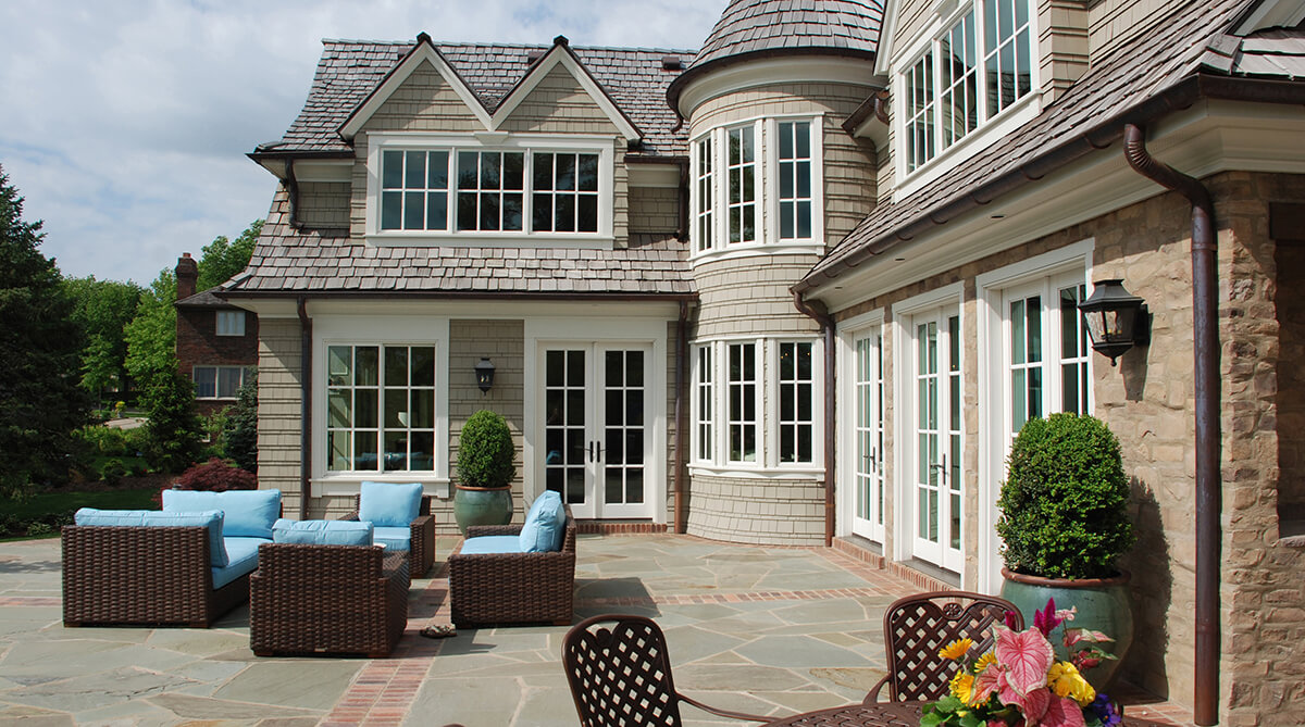 Rear Patio of Shingle Style Home in Lawrence, Kansas, Designed by NSPJ Architects