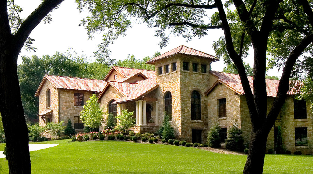 Exterior of Tuscan-Style Home in Mission Hills, Kansas. Architecture by NSPJ Architects.