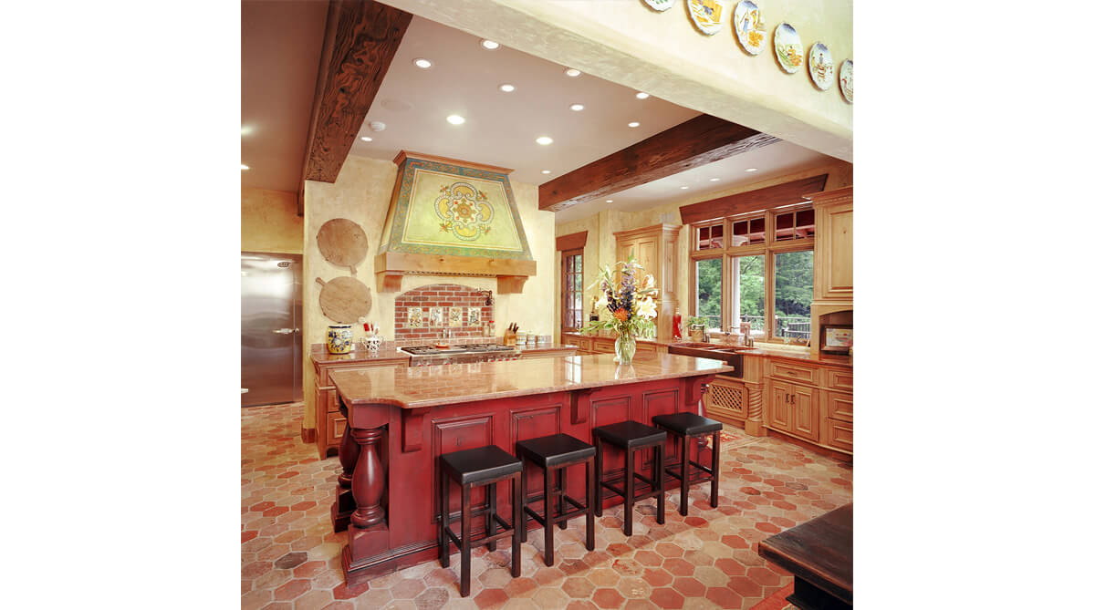 Kitchen in Tuscan-style home in Mission Hills, Kansas. Architecture and landscape architecture by NSPJ Architects.