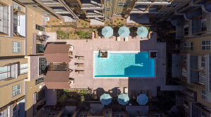 Aerial view of swimming pool at Village at Aspen Place, designed by NSPJ Architects