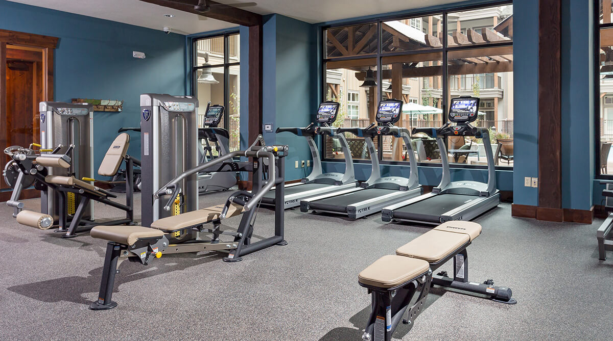 Gym at Village at Aspen Place, designed by NSPJ Architects