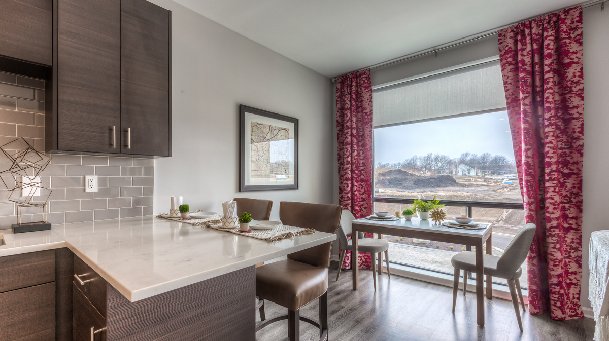 Dining area in unit at Royale at CityPlace, designed by NSPJ Architects