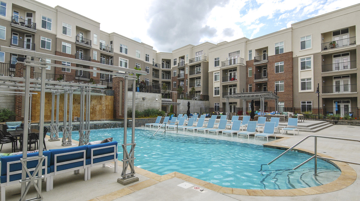 Courtyard Pool and Chaises at Domain at City Center in Lenexa, Kansas Designed by NSPJ Architects