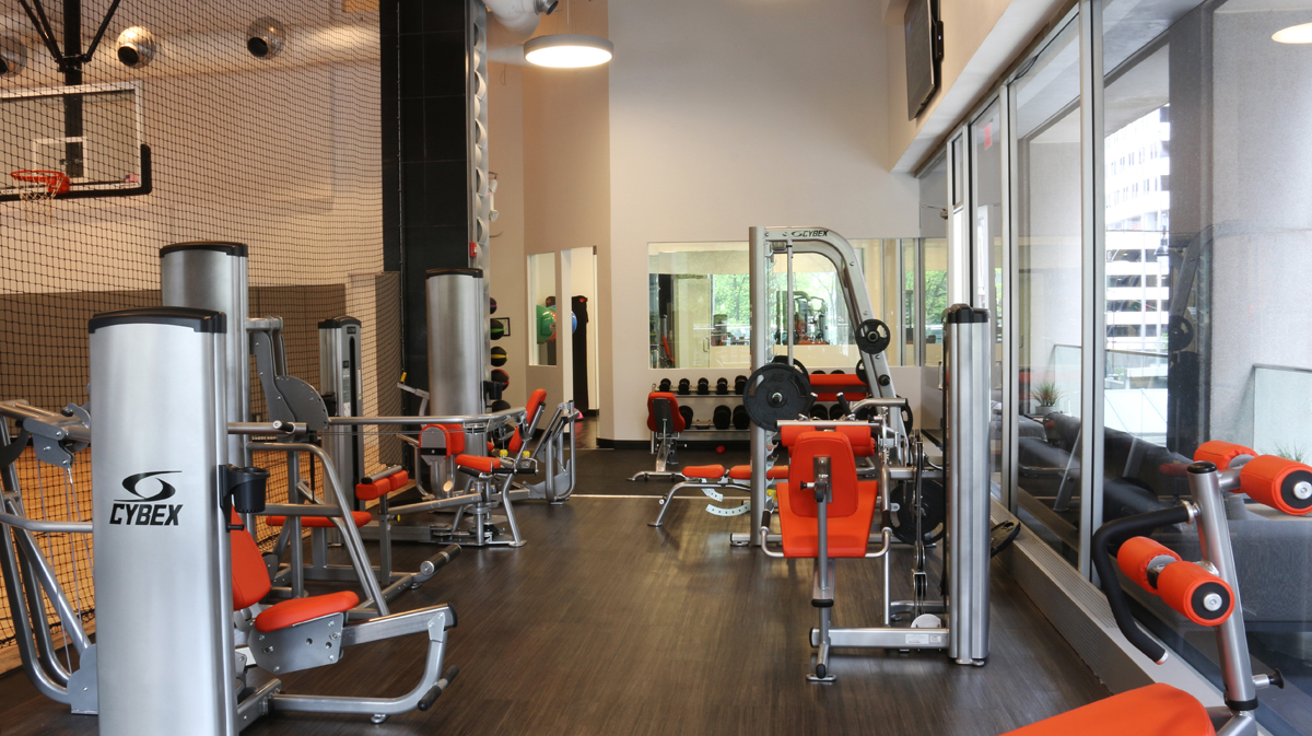 Weight room at Sky on Main Luxury Apartments, designed by NSPJ Architects