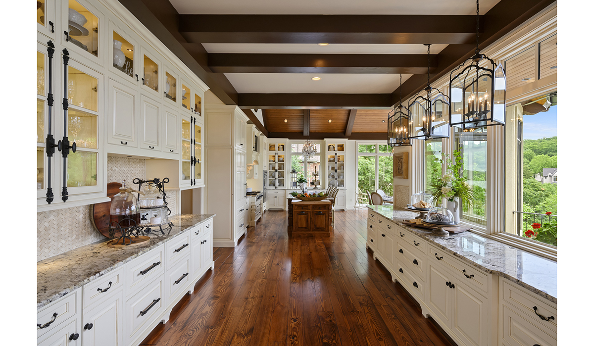 Kitchen at the Lake of the Ozarks Luxurious Home designed by NSPJ Architects
