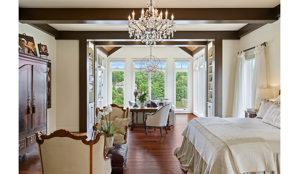 Master Bedroom at the Lake of the Ozarks Luxurious Home designed by NSPJ Architects