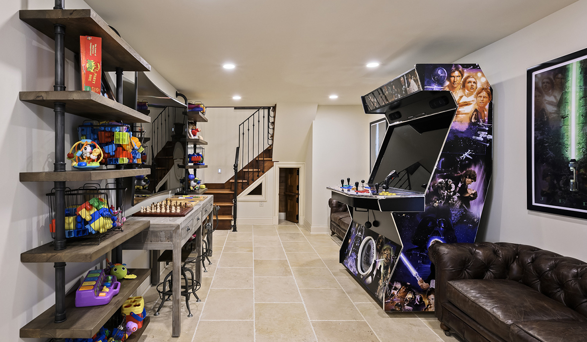 Game room at the Lake of the Ozarks Luxurious Home designed by NSPJ Architects