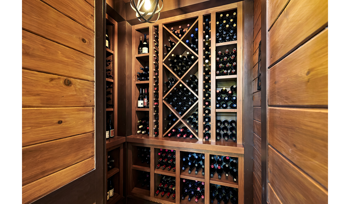 Wine Cellar at the Lake of the Ozarks Luxurious Home designed by NSPJ Architects