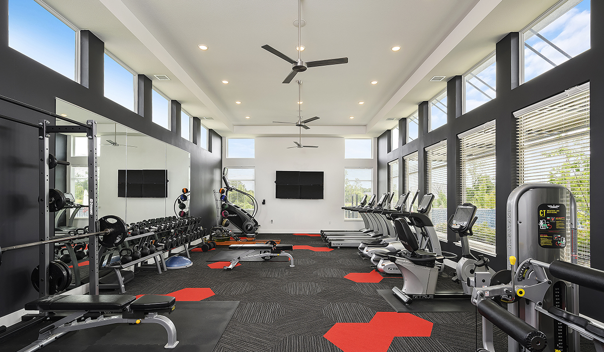 Fitness Center at Summit Square Apartments in Lee's Summit, Missouri designed by NSPJ Architects