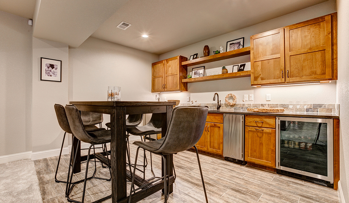 Basement Kitchen at Herron Lakes Townhomes in Fort Collins, Colorado designed by NSPJ Architects