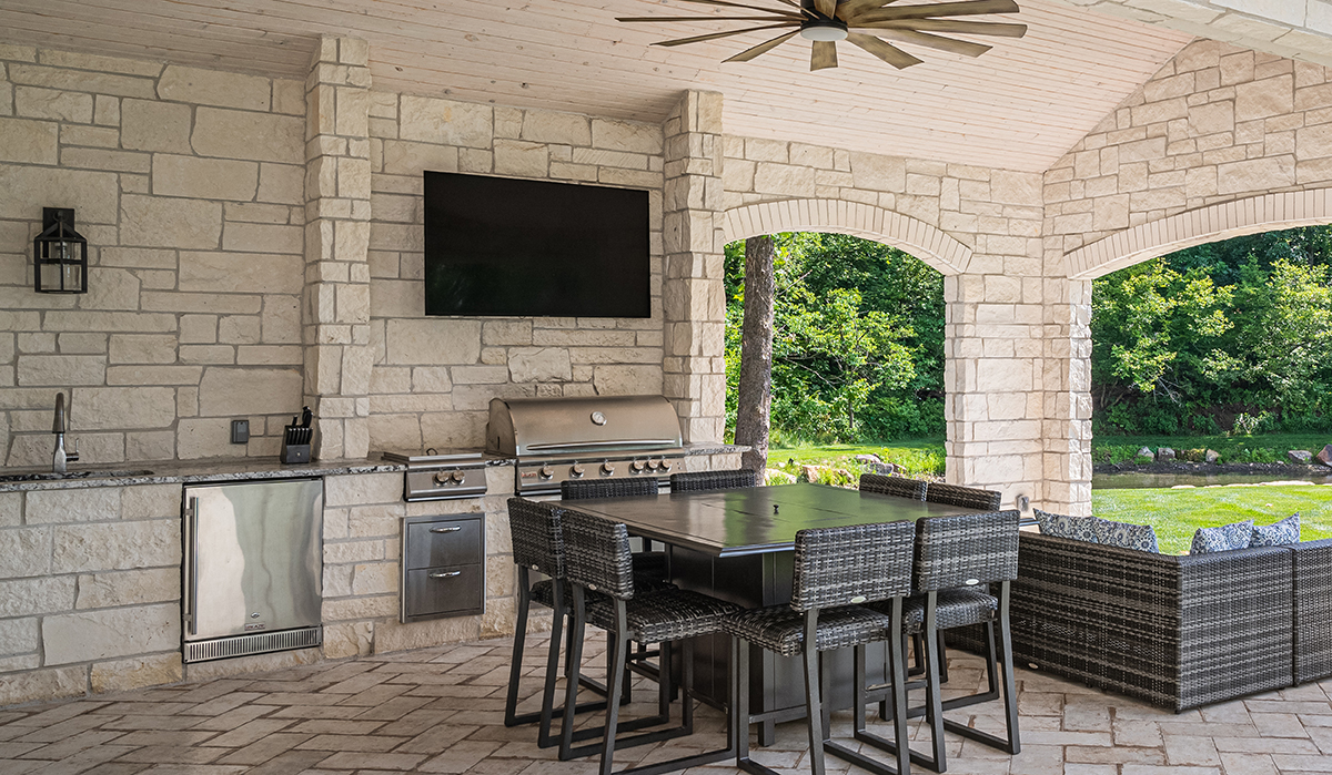 Modern Mediterranean Outdoor kitchen, stone exterior, outdoor eating, grilling area,